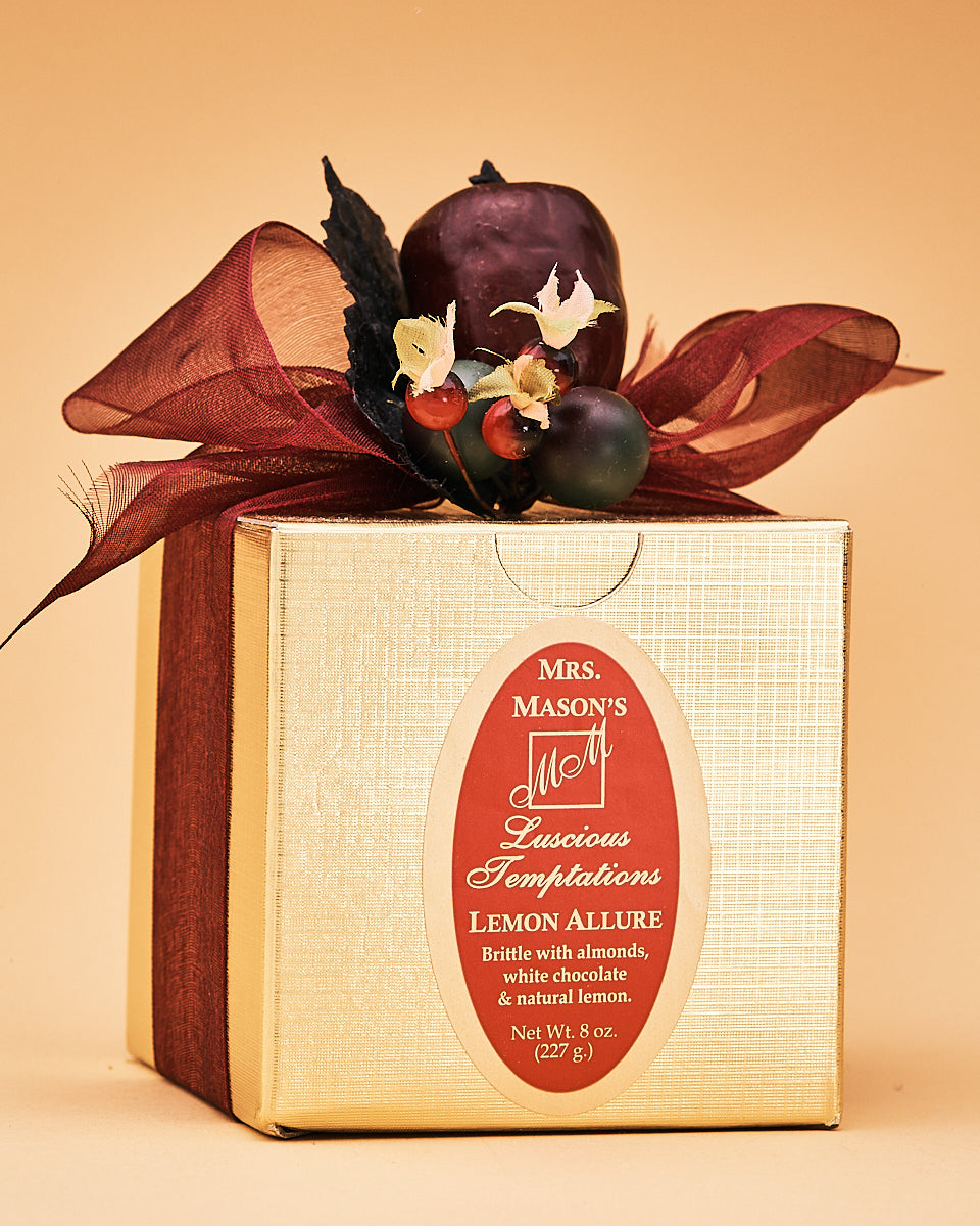Lemon Allure Brittle in half pound gold gift box in Fall wrap