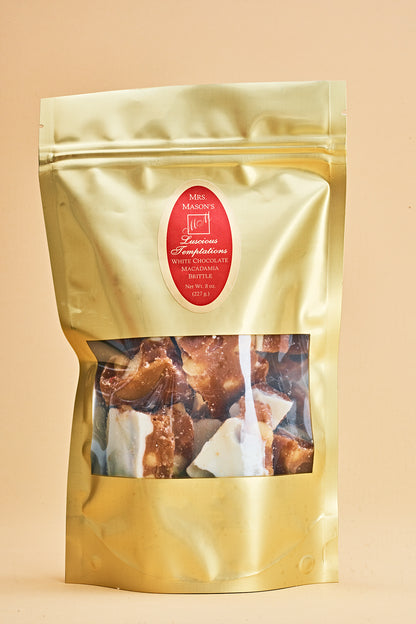 White Chocolate Macadamia Brittle in half pound gold foil bulk bag