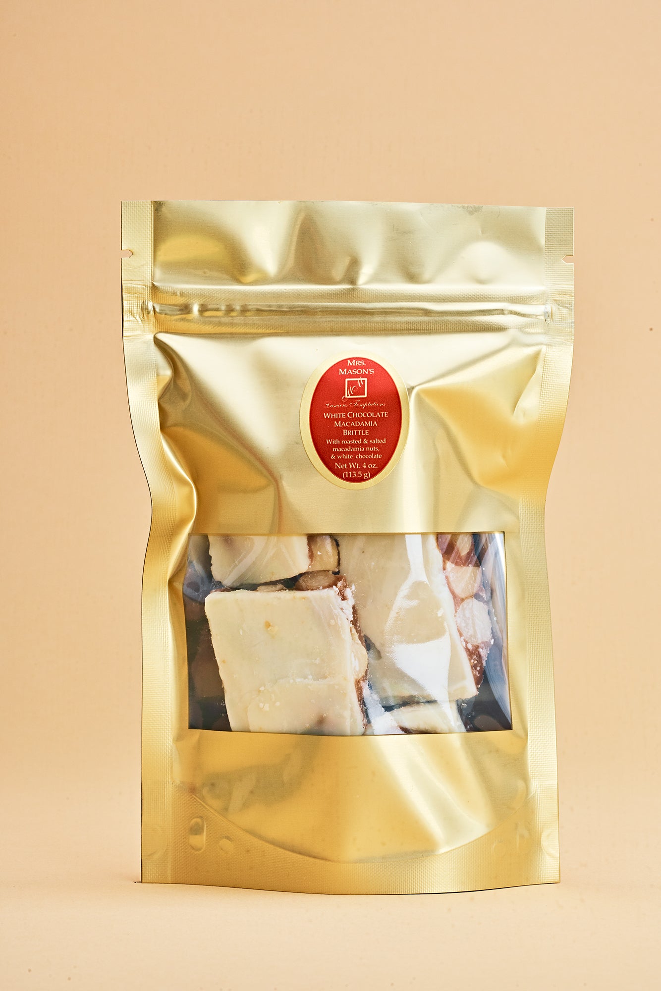 White Chocolate Macadamia Brittle in quarter pound gold foil bulk bag