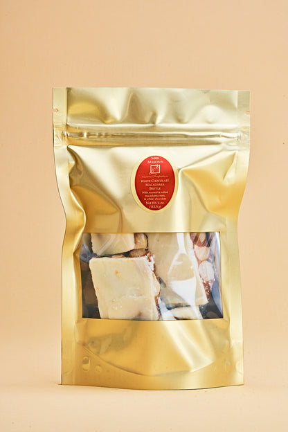 White Chocolate Macadamia Brittle in quarter pound gold foil bulk bag